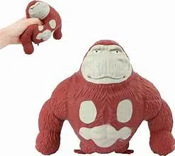 Figurine extensible rouge type “Stretcherz”, montrée en gros plan avec un exemple de jouet étiré à la main.