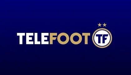 Logo Téléfoot affiché sur fond bleu, avec le nom de l’émission et son emblème circulaire.