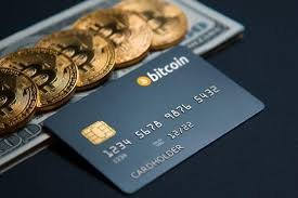Carte bancaire Visa liée au Bitcoin affichée sur un smartphone